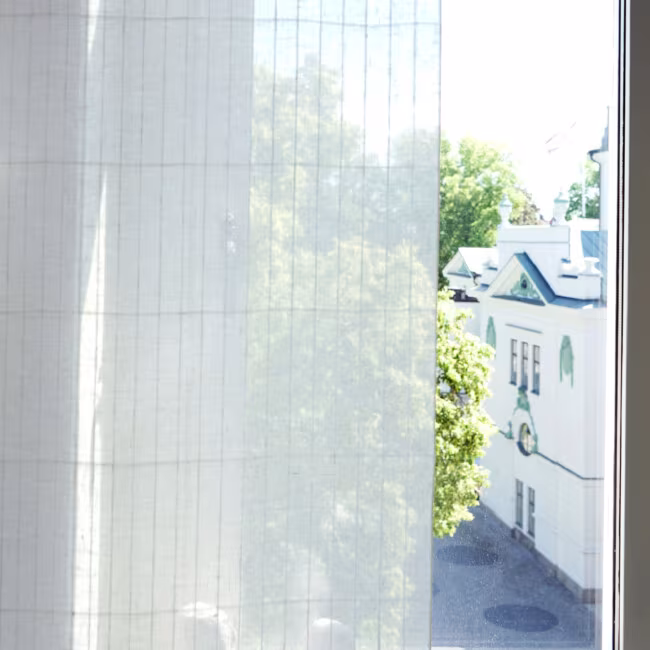 Manahttan curtain hung in window
