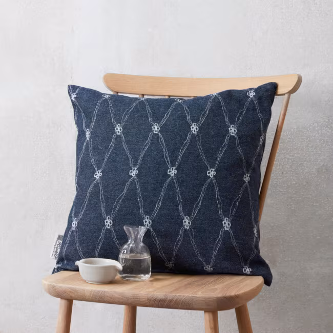 Decorative cushion dark blue with four-leaf clover print